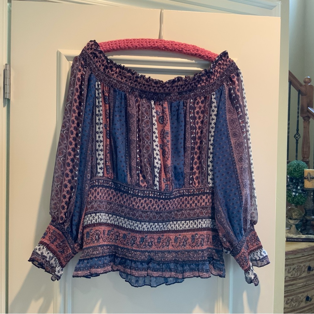 Women’s plus size off the shoulder blouse.